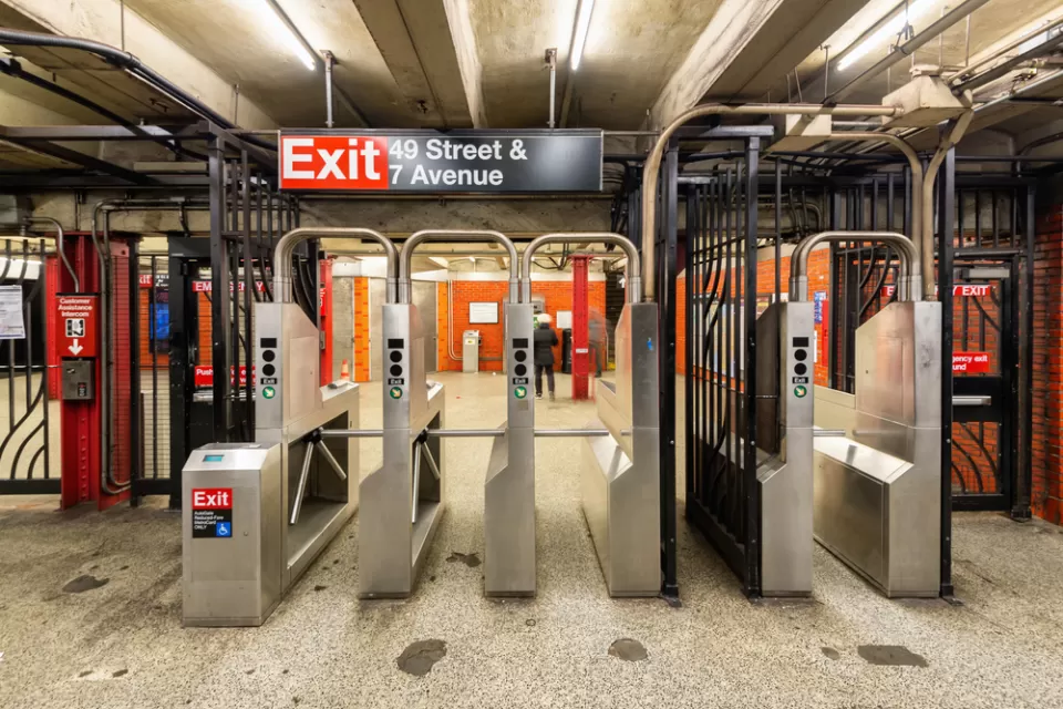 Empty fare turnstiles at New York City subway station